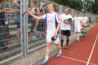 Spieler des FC Carl Zeiss Jena beim Abklatschen