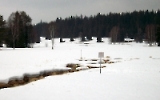 Weiße grüne Grenze zwischen Deutschland und Tschechien im Winter bei Schnee